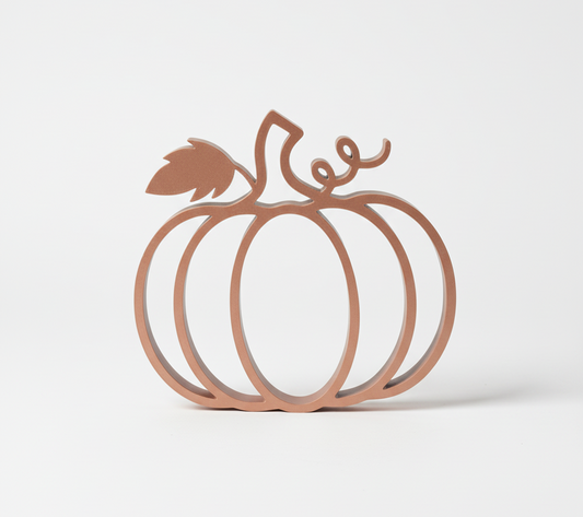 Minimalist pumpkin silhouette decor for modern fall styling