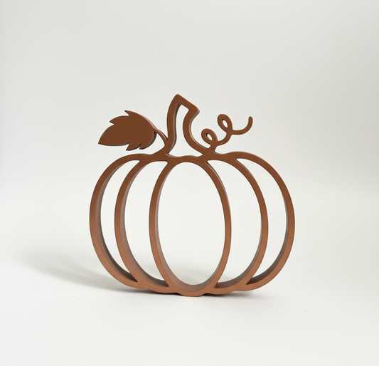 Minimalist pumpkin silhouette decor for modern fall styling